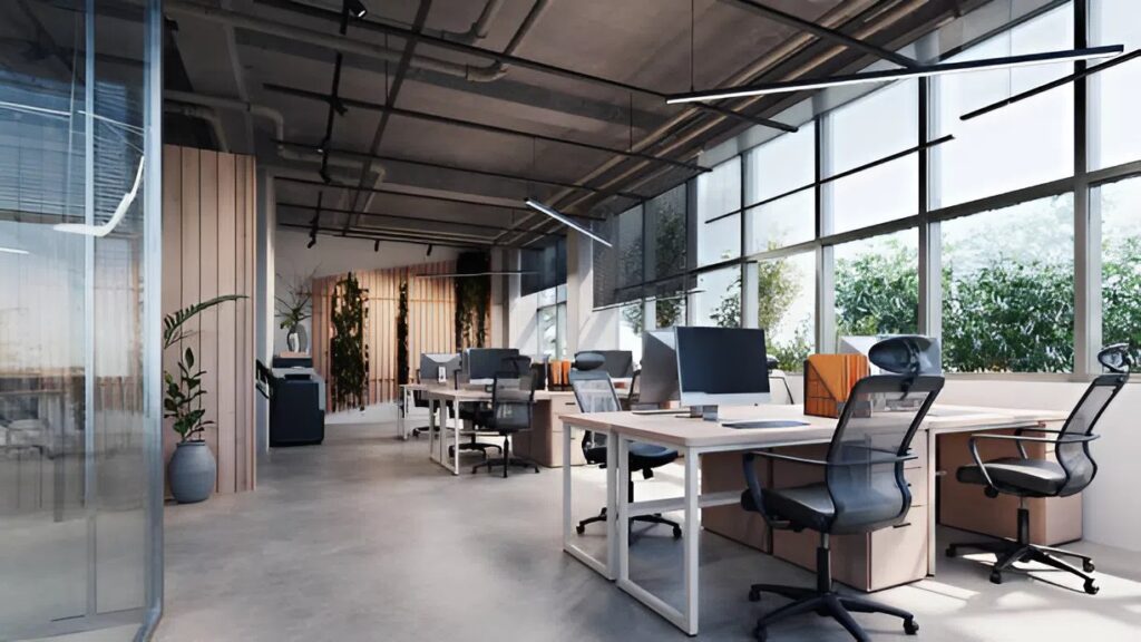 Office interior with natural light, workstations, and clean walls prepared for professional office painting