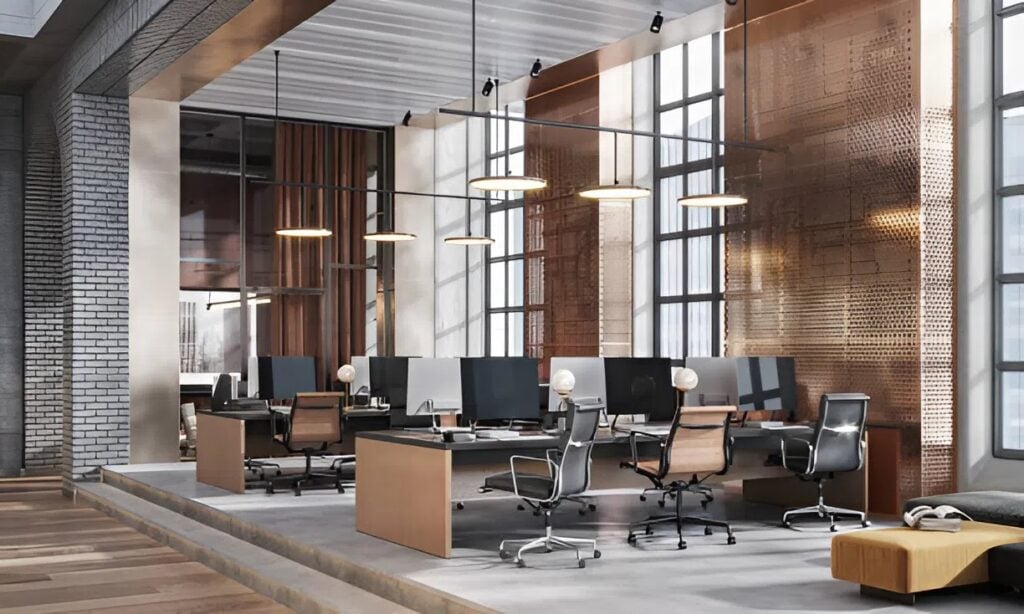 Workspace with desks, modern lighting, and smooth interior surfaces ready for office painting