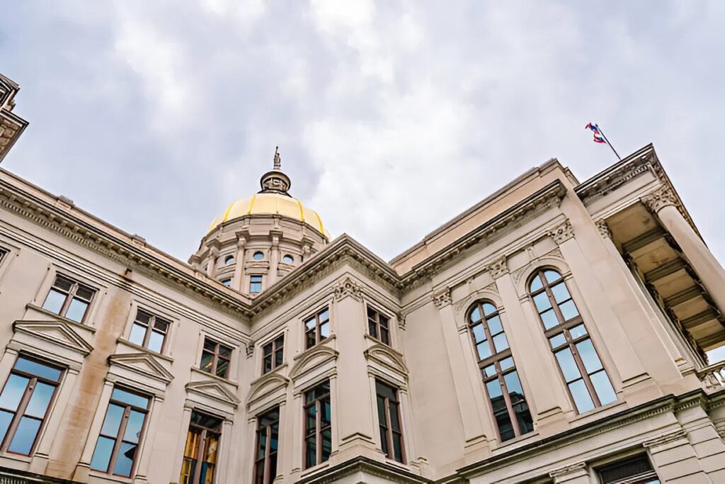 Historic government building exterior with detailed trim and weather-resistant coating by an exterior painter in Belmont, CA