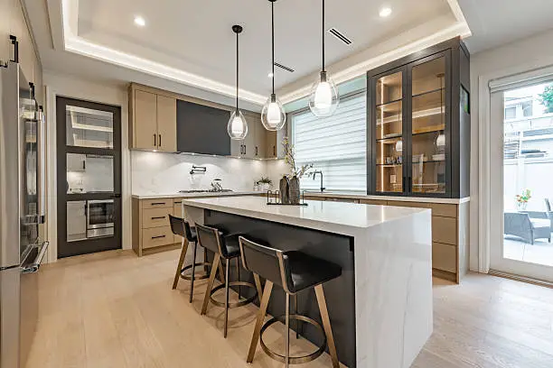 Modern kitchen with a neutral color palette and wood cabinets by an interior painter in Menlo Park, CA